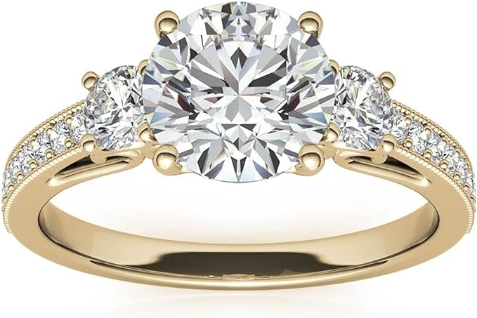 Moissanite Color: Yellow Gold round three-stone design with  accents. Main stone: 1 carat, 2 side stone: 0.5 carat, surrounded by some small moissanite.